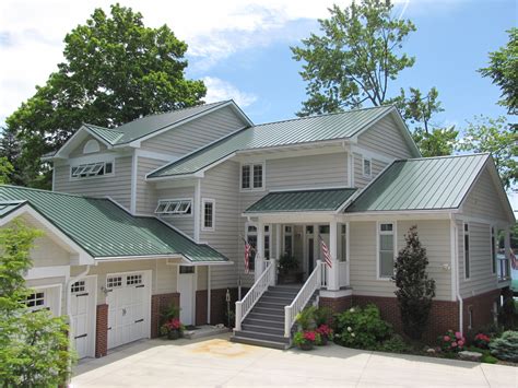 green metal roof on brick house|houses with metal roofs pictures.